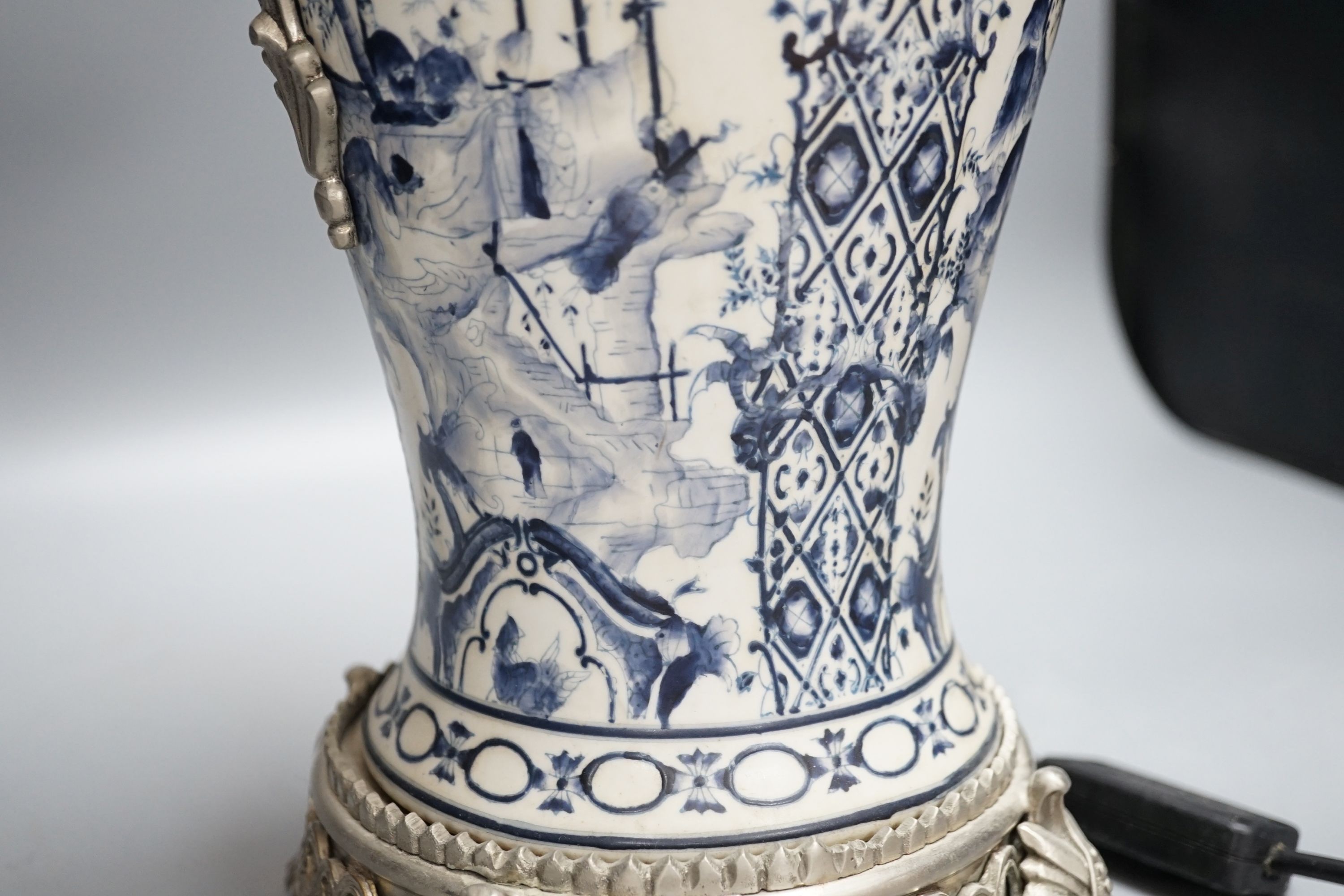 A blue and white chinoiserie and metal-mounted table lamp, 52cm
